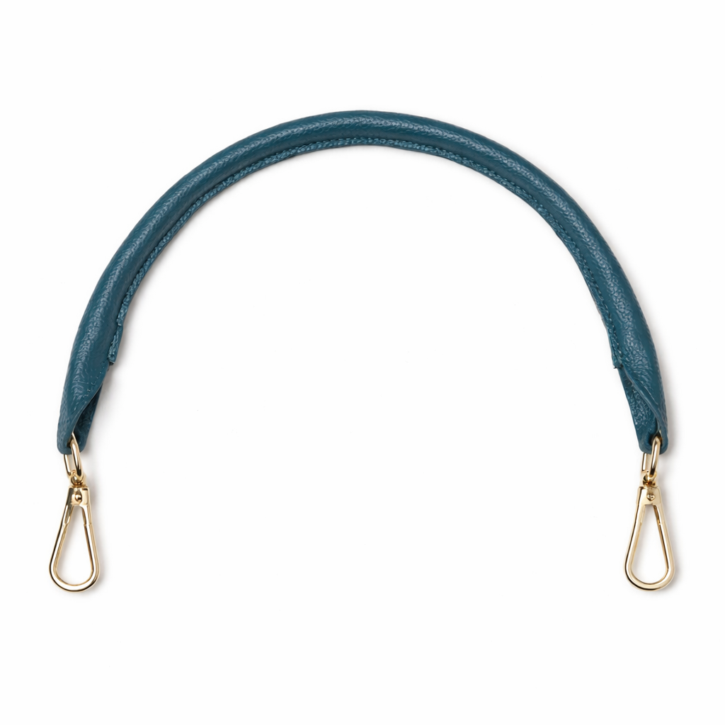 Teal leather strap with gold hooks on a white background