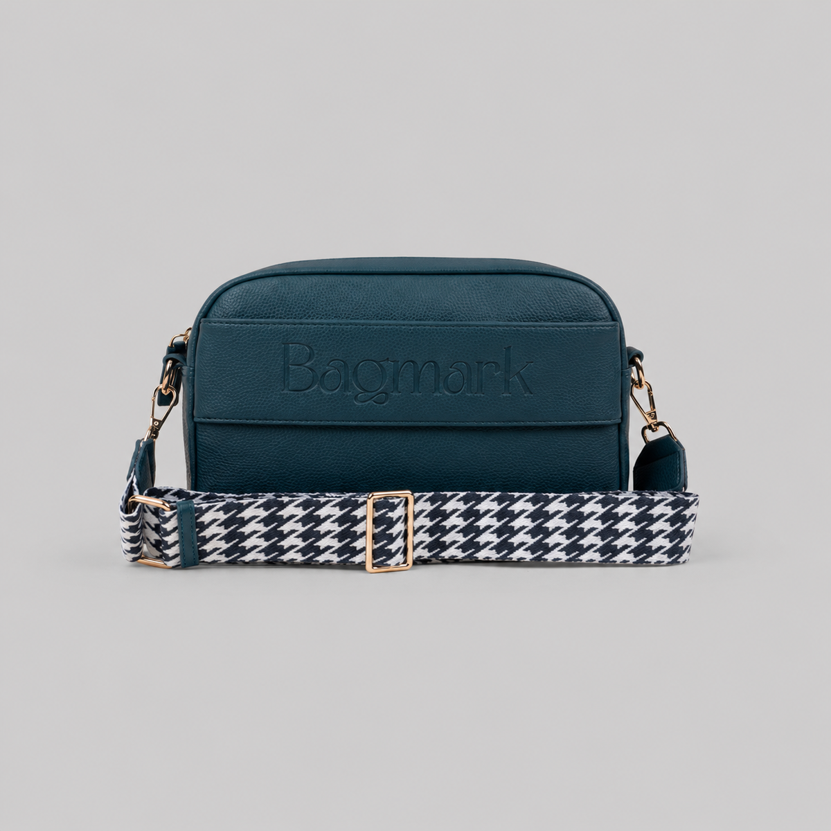 The Daily in Teal  bookmark crossbody bag with a patterned webbing strap