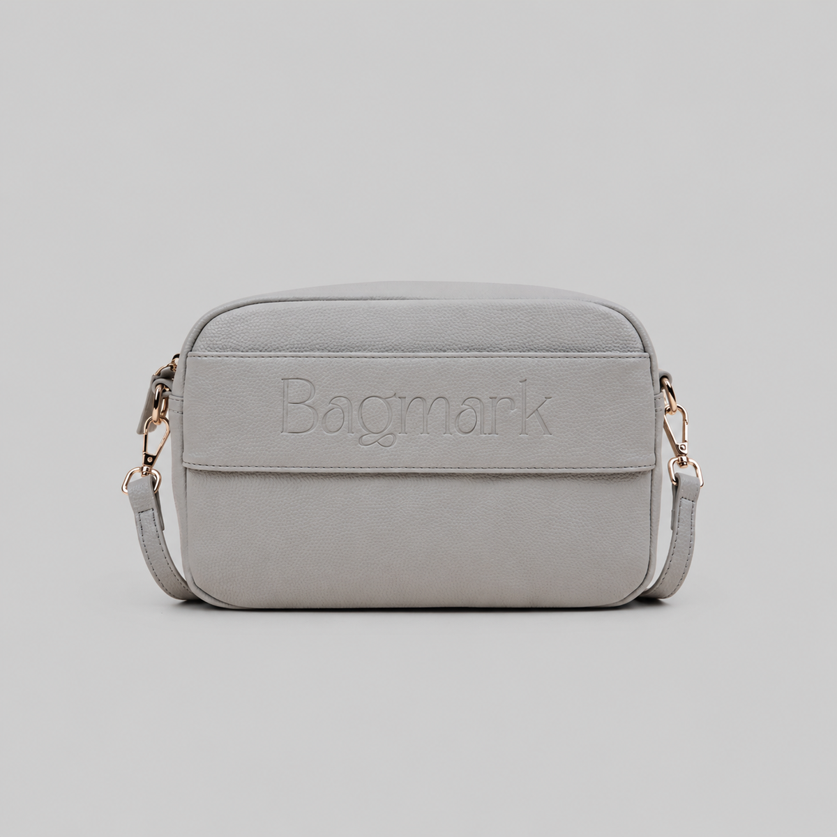 The Daily bag in Stone bookmark-inspired crossbody bag