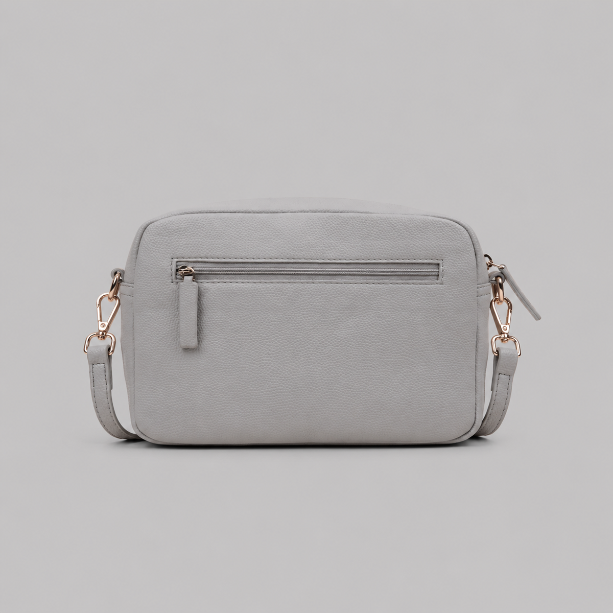 The Daily in Stone literary bag displaying back zip pocket