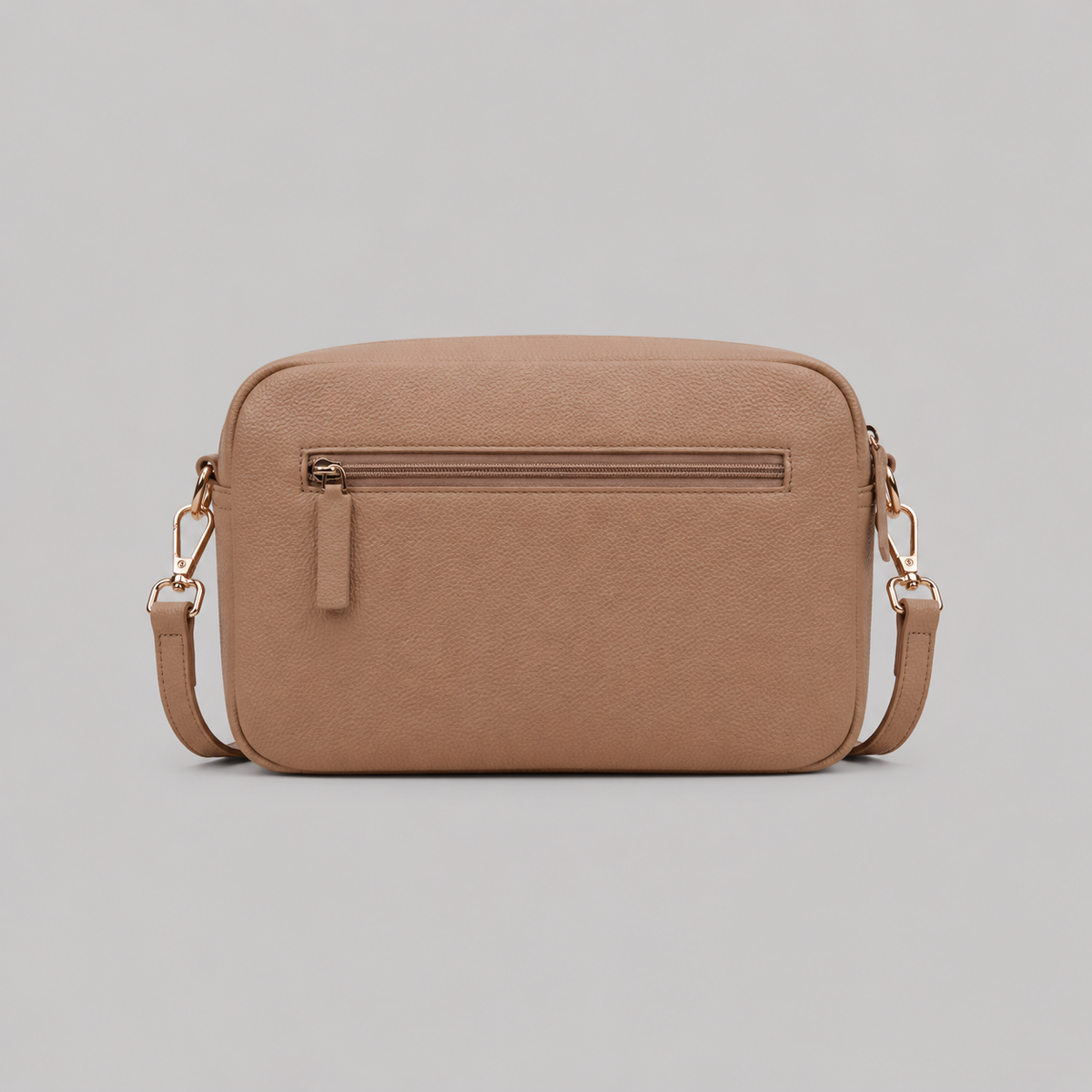 The Daily in Camel literary bag displaying back zip pocket
