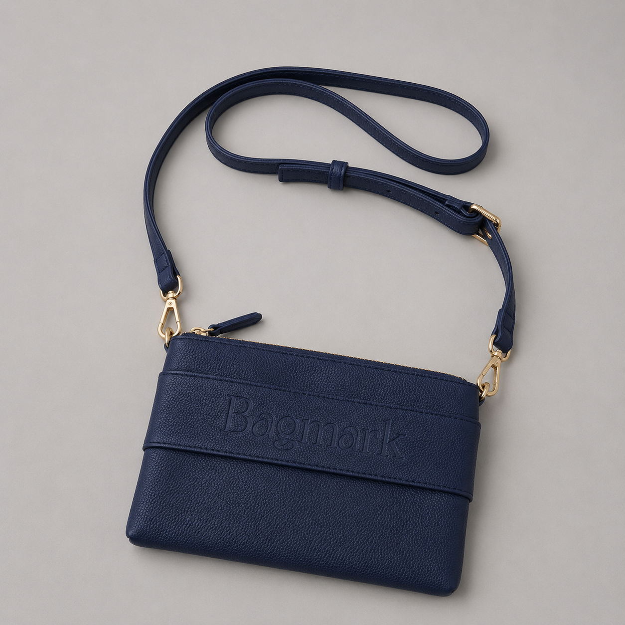 The Essential Navy bookmark-inspired crossbody bag