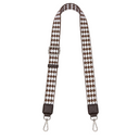 Houndstooth patterned strap with metal hooks on a white background