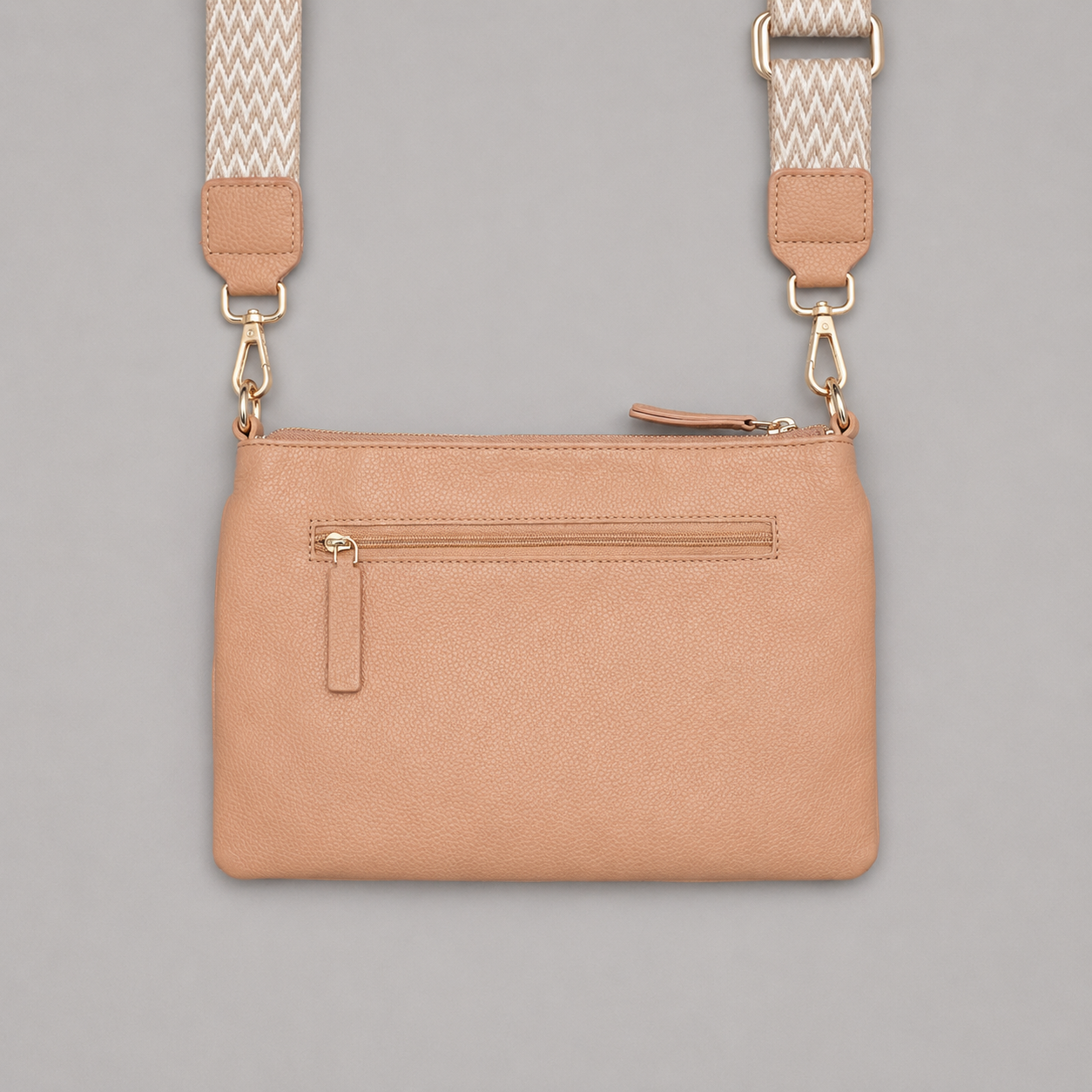 The Essential Camel literary bag displaying back zip pocket